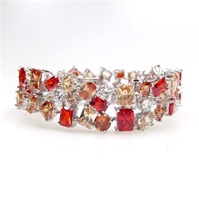 Silver Bracelet w/ Ruby, Champagne & White CZ.