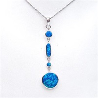 Silver Pendant with Inlay Created Opal