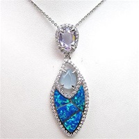 Silver Pendant with Inlay Created Opal, Syn. Chalcedony, White & Tanzanite CZ