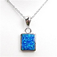 Silver Pendant with Inlay Created Opal